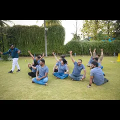 A moment of triumph during a team building game. Seeing the excitement and collaborative spirit is what makes these sessions so successful.