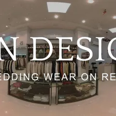 Another view of the store, showing the neatly organized racks of sherwanis, lehengas, and gowns, plus the accessories counter. I am your one-stop shop for wedding rentals.