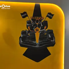We transformed this space into a dynamic kids' room with a custom racing car theme. The bold yellow background and hand-painted Formula 1 car create an exciting and personalized environment for any young racing enthusiast.