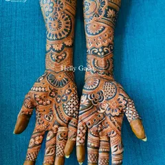 A full-hand geometric mehndi design, featuring mesmerizing patterns and mandalas for a contemporary yet intricate look.