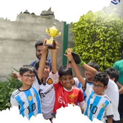 This is the moment all the hard work pays off. The pure joy of a team victory, lifting the trophy together. I ensure my players get regular competitive opportunities to test their skills, build teamwork, and experience the sweet taste of success.
