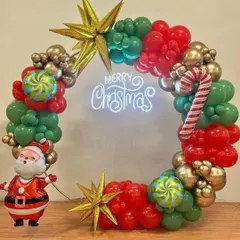 For a corporate Christmas party, I created this festive circular balloon wreath using red, green, and gold balloons. The setup includes a "Merry Christmas" neon sign, candy cane and star-shaped foil balloons, and a cheerful Santa Claus figure.