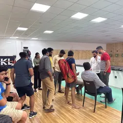 The atmosphere during a corporate event is a mix of focus and relaxed interaction. It's an opportunity for team members to connect in a different and memorable way.