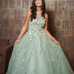 A vision in this pastel mint green gown. I created a soft glam makeup look with peachy glossy lips and gentle waves in her hair to complement the delicate, ethereal feel of her outfit.