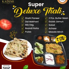 Our Super Deluxe Thali: A Complete Meal. This image details everything you get in our Super Deluxe Thali. It's a perfectly balanced meal with a variety of our best dishes, all without onion and garlic.