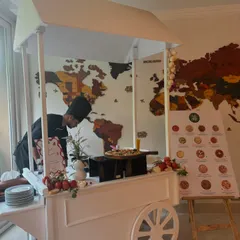 My versatile white pizza cart can be set up indoors as well. Here it is at a Halloween-themed party, ready to serve fresh Neapolitan pizzas to guests.