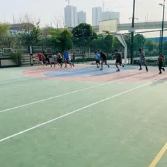A wide shot of our team doing sprints across the court to improve their speed.