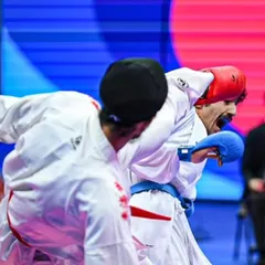 A close-up action shot from the World Karate Federation (WKF) coverage of the Asian Championship. Every match is a physical and mental chess game.