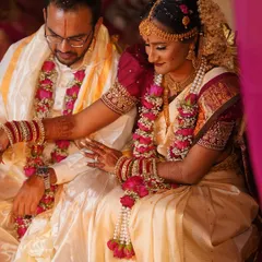 My lovely South Indian bride and groom during their ceremony. Her makeup was designed to be long-lasting and radiant, complementing her beautiful silk saree.