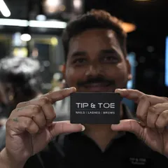 A smile from one of our talented team members. We are here to provide you with the best service and a memorable salon visit.