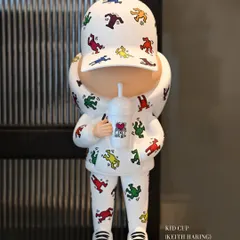 The full 'Kid Cup (Keith Haring)' sculpture. This character is never without their cup, a symbol of their love for life and all it has to offer.