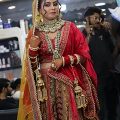 The full bridal look. I work not just on the face, but on the entire presentation, including how the dupatta is set and how the jewelry sits. Every detail matters for the final picture.