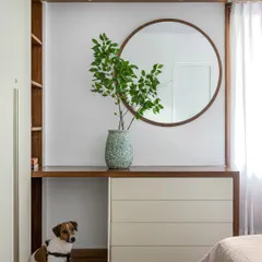 A custom vanity and dresser unit in the 'Pepper and Coffee' bedroom, designed to be simple, functional, and pet-friendly.