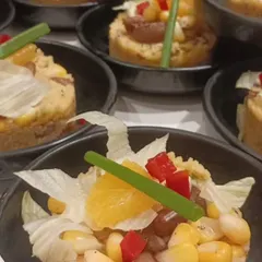 A progressive Indian appetizer served at Ayushmann Khurrana's birthday soirée. This dish, featuring a modern take on corn salad, showcases our innovative approach to desi flavors for a discerning palate.