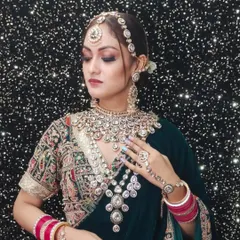 A beautiful example of a layered Polki and Kundan set. The combination of a choker and a long, cascading necklace adds depth and grandeur, perfect for a bridal lehenga.