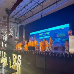 The junior students take the stage in their bright costumes. We ensure that even the youngest performers feel confident and happy during their annual day dance performance.