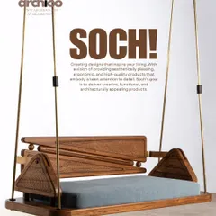 An iconic Soch Design Studio swing, featuring a unique, angular backrest with hand-chiseled detailing. Suspended by strong brass rods, this piece combines ergonomic design with architectural appeal, creating a functional and artistic focal point.
