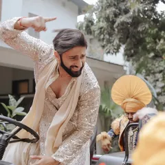Our choreographer enjoying the baraat festivities, dancing on a tractor at a 'Pyaar Da Pind' themed wedding.
