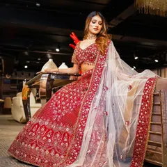 A different angle to highlight the elegance of the bridal outfit. The pose and expression convey a sense of quiet confidence, making this a perfect shot for showcasing bridal fashion with a touch of grace.