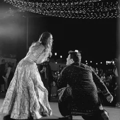 A classic Bollywood pose for a timeless love story. This black and white shot from Kasturi and Vineet's Vogue-featured wedding captures the romance of their couple performance. We make sure every moment on stage is picture perfect.