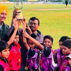 The joy of victory is universal. Here, our young champions from a mixed-gender youth tournament celebrate their win, showcasing the vibrant and encouraging atmosphere we foster for the next generation of cricketers.