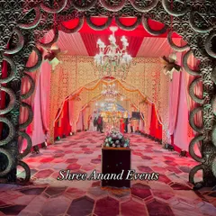 We specialize in creating royal wedding entrances that exude opulence. This intricately designed archway, with its rich red and gold palette and traditional motifs, promises a celebration steeped in grandeur.