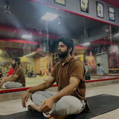A moment of quiet meditation in my studio. I create a peaceful environment where participants can disconnect from work and reconnect with themselves.
