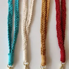 Introducing my macrame lanyards, shown here in four popular colors: turquoise, cream, mustard, and red. They are a stylish way to keep your ID card or keys handy.
