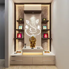 We created this modern pooja mandir with a backlit Ganesha motif as the centerpiece. The design includes floating shelves for idols and a sleek base cabinet for storage, all illuminated with warm, ambient lighting.