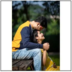 A tender forehead kiss captured in a casual setting. You don't always need a gown to create a beautiful and emotional maternity photo.