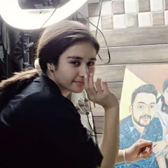A candid moment captured in my studio. This is where the magic happens, where I spend countless hours turning your precious memories into art.