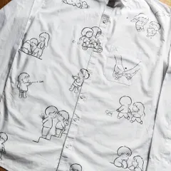 This is what I mean when I say "wear your story". I covered this entire shirt in cute, minimalist doodles that represent a couple's journey and inside jokes. It's a fun and personal way to celebrate your connection.