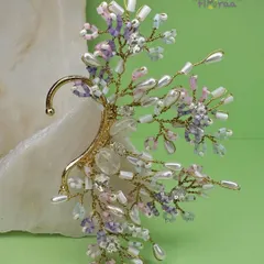 An edgy yet delicate earcuff from our FLORAA collection. I crafted this piece with soft-hued crystal beads and freshwater pearls to give a unique, statement look for a brunch or a day event.