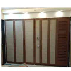 This floor-to-ceiling wardrobe shows how I can maximize storage in any bedroom. I used a combination of patterned and louvered shutters to add a unique decorative touch, creating a piece that is both a storage powerhouse and a design statement.