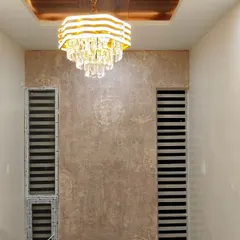 A different angle of the elegant textured wall, showing how it interacts with the room's lighting and architectural details. This type of finish is perfect for adding character to hallways or living areas.