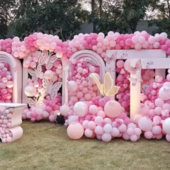 We created this breathtaking wall of pink balloons for an unforgettable outdoor event. This massive installation features thousands of balloons in varying shades and sizes, accented with intricate butterfly cutouts to create a stunning, textured backdrop perfect for photos.