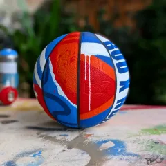 I can paint on pretty much anything. It was a blast to create this custom basketball for an NBA and Budweiser event, mixing my graffiti style with the energy of the game.