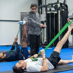 Guided stretching with resistance bands is a technique I use to improve mobility and reduce tightness during recovery. This helps restore pain-free range of motion.