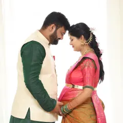 An intimate moment between the couple during their baby shower. Even amidst the celebration, I look for these quiet, personal connections to photograph.