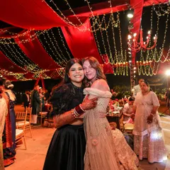 We believe a reception should feel like a galaxy of joy. For this night, we draped the sky in rich red fabric and a constellation of fairy lights, creating a warm, vibrant space where guests could share laughter and make memories under the stars.