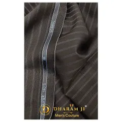 It all begins with the fabric. This pinstriped Super 140's wool is a premium choice for crafting a bespoke suit, offering a beautiful drape and luxurious feel.
