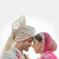 A simple, happy moment. Foreheads touching, smiles all around. This is the essence of candid couple photography, capturing the pure joy of being together.