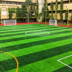 Another angle of our versatile turf at the VET Campus in JP Nagar. With two goalposts set up, it's ideal for a competitive football match or a casual kickabout with friends.