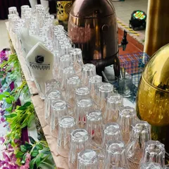 For tea and coffee lovers, I set up a dedicated station. This one features a variety of options including Masala Tea, Saffron Tea, Coffee, and Iced Tea, served with cookies.