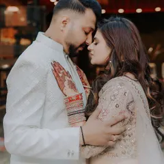 An intimate couple portrait from an engagement ceremony. We use soft lighting and close framing to capture the deep connection and affection between the couple as they begin their journey together.