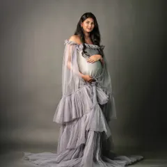 Feel like a queen in one of my elegant maternity gowns. I provide a full wardrobe and styling, so you can simply relax and embrace the beauty of this special time while I create breathtaking portraits.