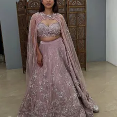 A full-length shot showcasing the entire modern silhouette of the cape lehenga. A true gem from my pre-loved collection.