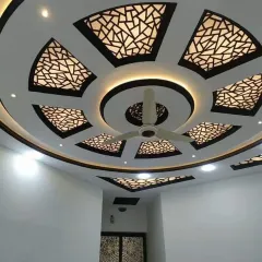 For a touch of pure elegance, I specialize in intricate backlit jali work. This design uses a detailed geometric pattern, creating a stunning visual effect that adds depth and a premium, decorative look to the ceiling.