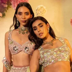 A shot of two models from the Surabhi Chopra lookbook. This highlights how different pieces from the same collection can be styled to create complementary looks, perfect for bridesmaids.