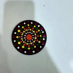 This is a finished piece from my dot Mandala workshop. Using simple tools, we build up the design dot by dot, creating a beautiful, textured artwork on a coaster.